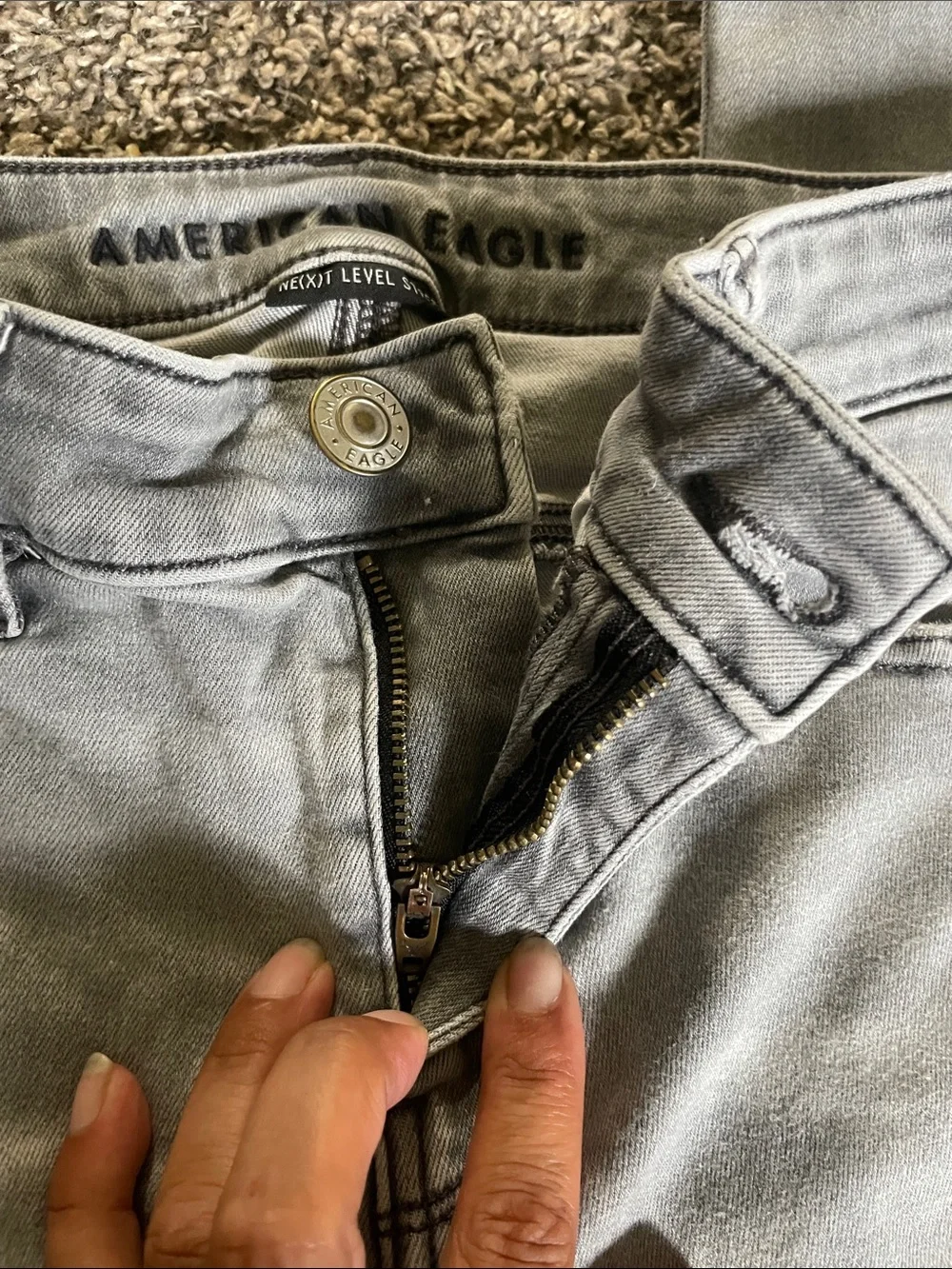 American Eagle Outfitters Light Gray Ripped Skinny Jeans